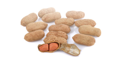 Fototapeta na wymiar Peanuts, nuts in shells on white background.