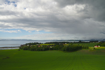 Fototapeta na wymiar Scenic green landscape of Norway during summer time