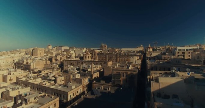 Flying over Valletta revealing Birgu