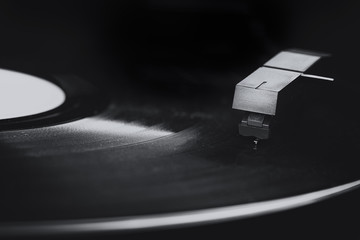 Macro of old vinyl record player in black and white