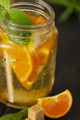Refreshing summer cocktail with chopped ice and citrus fruits