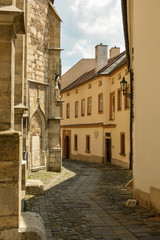 Fototapeta na wymiar Old narrow street in city centre of Brno