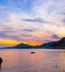 Awesome colorful sunset on the Adriatic sea coastline in Montenegro, gorgeous seascape