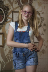 Soft focus portrait.Optics style. Portrait of a beautiful smiling young woman wearing elegant glasses. 