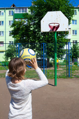 School Girl Shooting Basketball and Playing Basketball