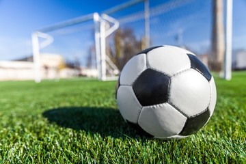 Closeup of a Soccer Ball and Goalpost