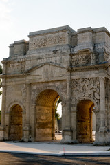 Fototapeta na wymiar The Triumphal Arch of Orange (French: Arc de triomphe d'Orange) is a triumphal arch located in the town of Orange, southeast France