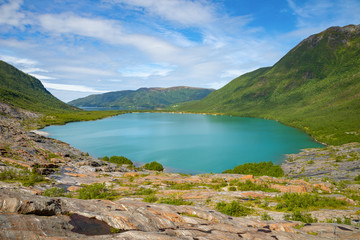 Naklejka na ściany i meble Panorama of Lake Svartisvatnet in Helgeland in Nordland, Norway, from Svartisen glacier