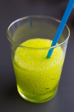 glass with slush lime or green apple