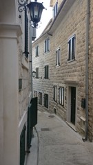 Fototapeta na wymiar Beautiful alley in old town, Herceg Novi, Montenegro.