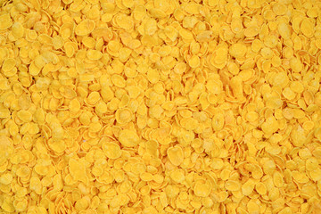 Corn-flakes background and texture. Top view. cornflake cereal box for morning breakfast.