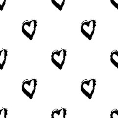 Vector seamless pattern with brush heartss. Black color on white background. Hand painted grange texture. Ink grange elements. Decorative ornament of love sign. Repeat fabric print.