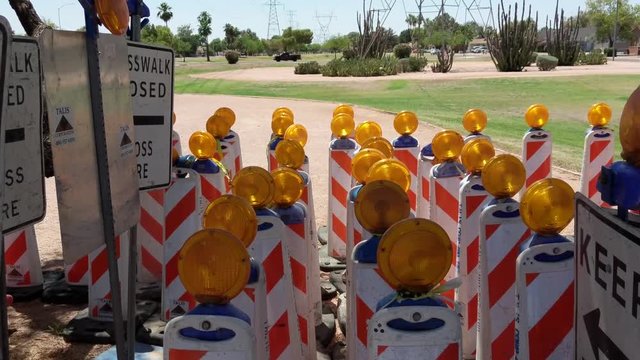 Traffic Signs Gathered Together on a Desert Road