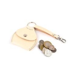 Nude coin purse with coins
