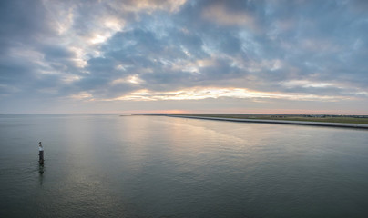 Beautiful and colorful sunset sky over the North Sea, Holland