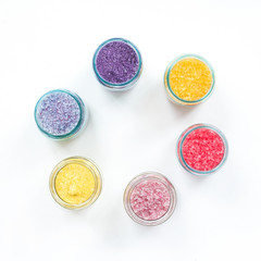 Colorful spa composition. Sea salt on white background, flat lay, top view
