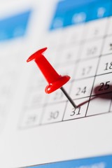Closeup of a Calendar with Pin