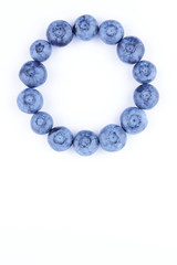 Blueberries on white background, blueberry berries isolated, blue berries close-up, blank for designer, vegetarian food for breakfast