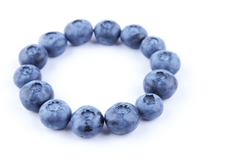 Blueberries on white background, blueberry berries isolated, blue berries close-up, blank for designer, vegetarian food for breakfast