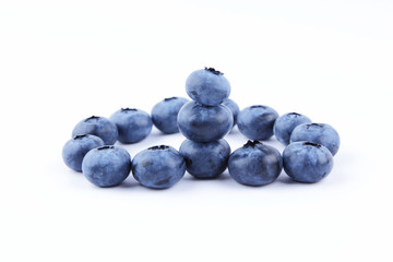 Blueberries on white background, blueberry berries isolated, blue berries close-up, blank for designer, vegetarian food for breakfast