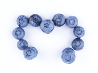 Blueberries on white background, blueberry berries isolated, blue berries close-up, blank for designer, vegetarian food for breakfast