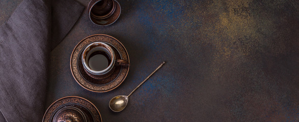 Turkish Coffee on the Dark Background Retro Style Two Bronze Cups - obrazy, fototapety, plakaty