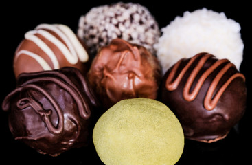 Truffles on a black background