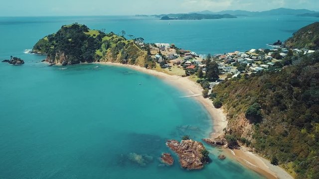 Tapeka Beach Point, beautiful beach in new zealand bay of islands. Aerial pull back / zoom out in 4k.