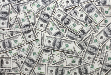 heap of one hundred dollars notes as textured background