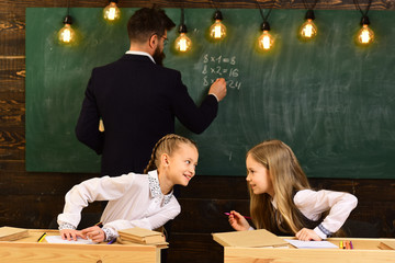High school college students studying and reading together in class education concepts. Student...