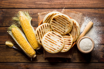Fototapeta na wymiar One of the dishes of the traditional Latin American cuisine, arepas of pre-cooked corn