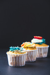Banana cupcake with strawberry in Dark lighting