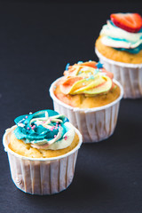 Banana cupcake with strawberry in Dark lighting