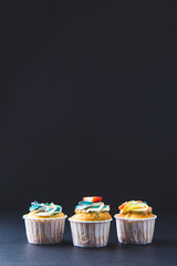 Banana cupcake with strawberry in Dark lighting