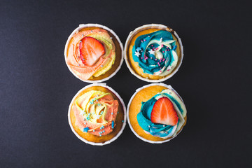 Banana cupcake with strawberry in Dark lighting