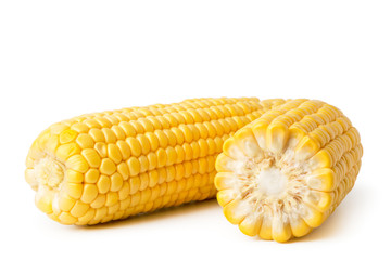 Ripe peeled corn close-up, on a white.