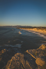 Wide angle panoramic view over the walker bay nature reserve along the overberg coastline in south africa