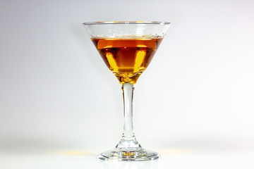 A delicious cocktail waiting on a white counter waiting to be consumed