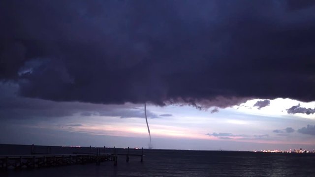 Waterspout in Tampa Bay spotted from Harbor Inn in Ruskin, FL. around 9:00 pm on Father's Day June 17, 2018.