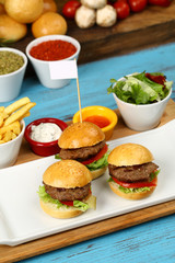 Small beef sliders grilled burgers - Three small burgers