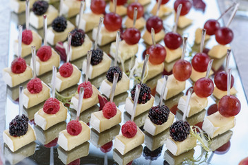 Small pieces of cheese with fruit.