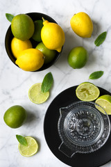 Lemons and limes ready to be squeezed