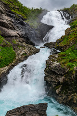 Raging Waterfall Kjosfossen. View from Flom Railway (Flomsbana). Sogn og Fjordane, Norway, Europe