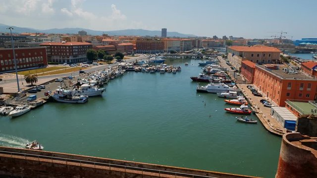Panoramic view of the Livorno Old Harbor and historic center shot from the Old Fortress in Tuscany, Italy. Livorno  is a port city on the Ligurian Sea on the western coast of Tuscany, Italy