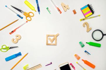 election of the president of the class and school. Election check box and school accessories on a desk on a white background. education. stationery, watches, colored pens, phone, markers. notebook.