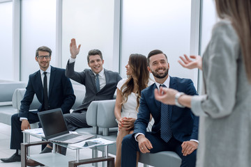 business woman makes a presentation for the business team.