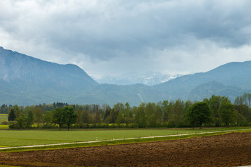 landscape in the Alps with snow-capped mountain peaks in the background, Bavaria, Germany