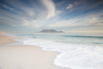 Stunning clouds over Table Mountain in Cape Town South Africa,as seen from blouberg beach, one of the top holiday destinations in the world