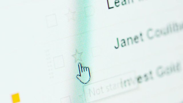 Macro shot of email inbox browsing on a computer monitor