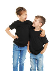 Little kids in t-shirts on white background. Mockup for design